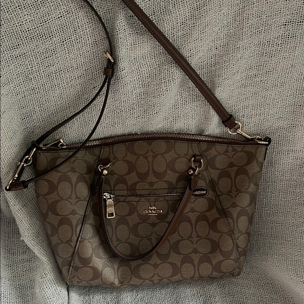 Coach Brown cross body with Monogram Pattern